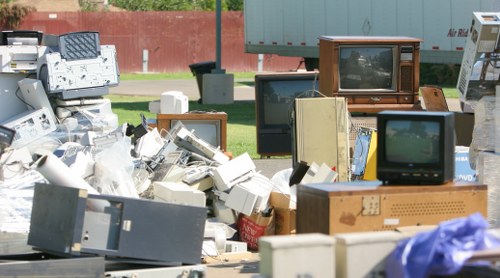 A clean and organized construction site with a hired skip